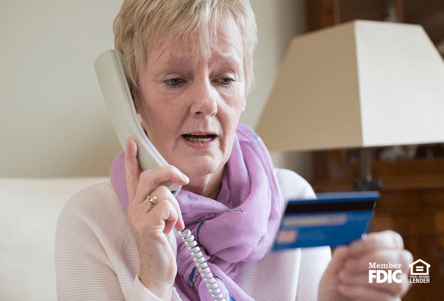 an older woman calls her bank to talk about how to avoid phishing attempts