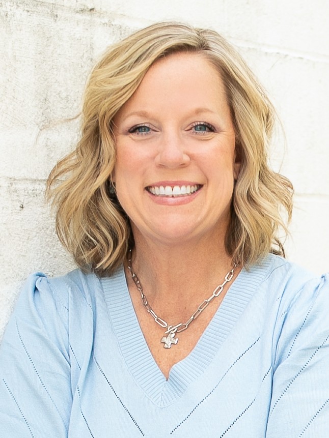 headshot of Adrianne Tucker, mortgage loan officer at Academy Bank