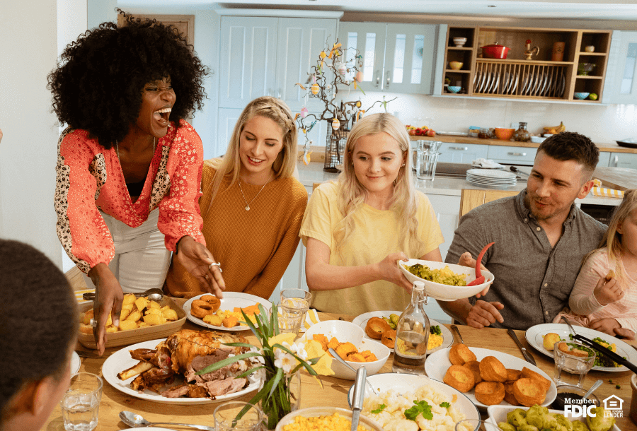loved ones celebrate by eating a big meal together