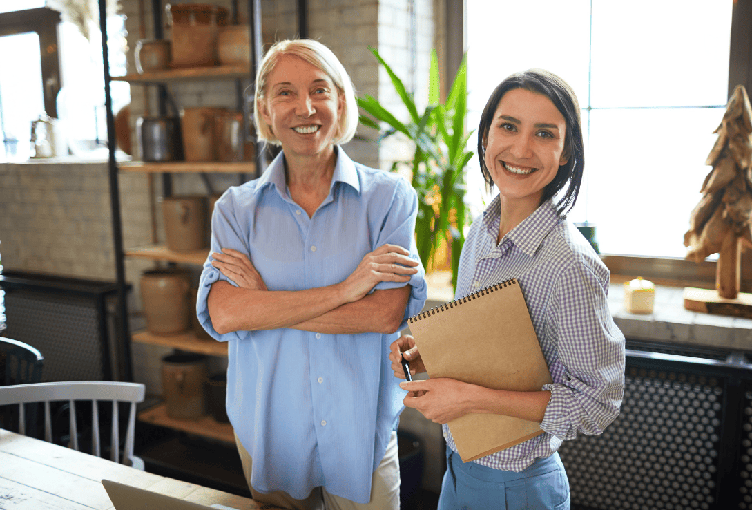 Two small business entrepreneurs benefitting from the best small business loan.