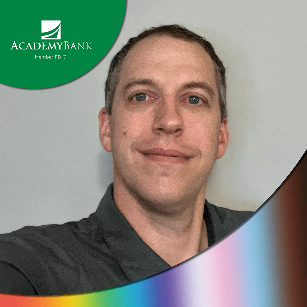 LGBTQ+ Academy Bank employee smiles for their pride month profile.