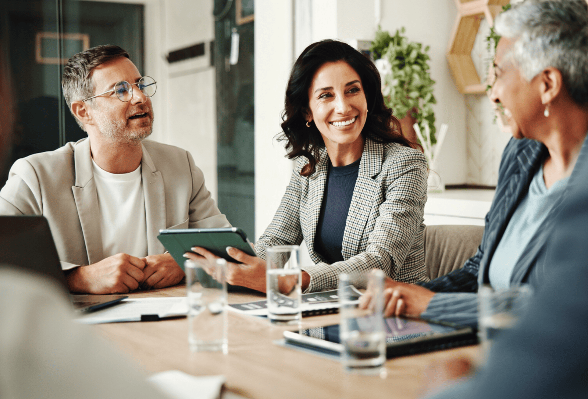 Commercial lending experts meeting with financial sponsor in sponsor-backed lending deal.