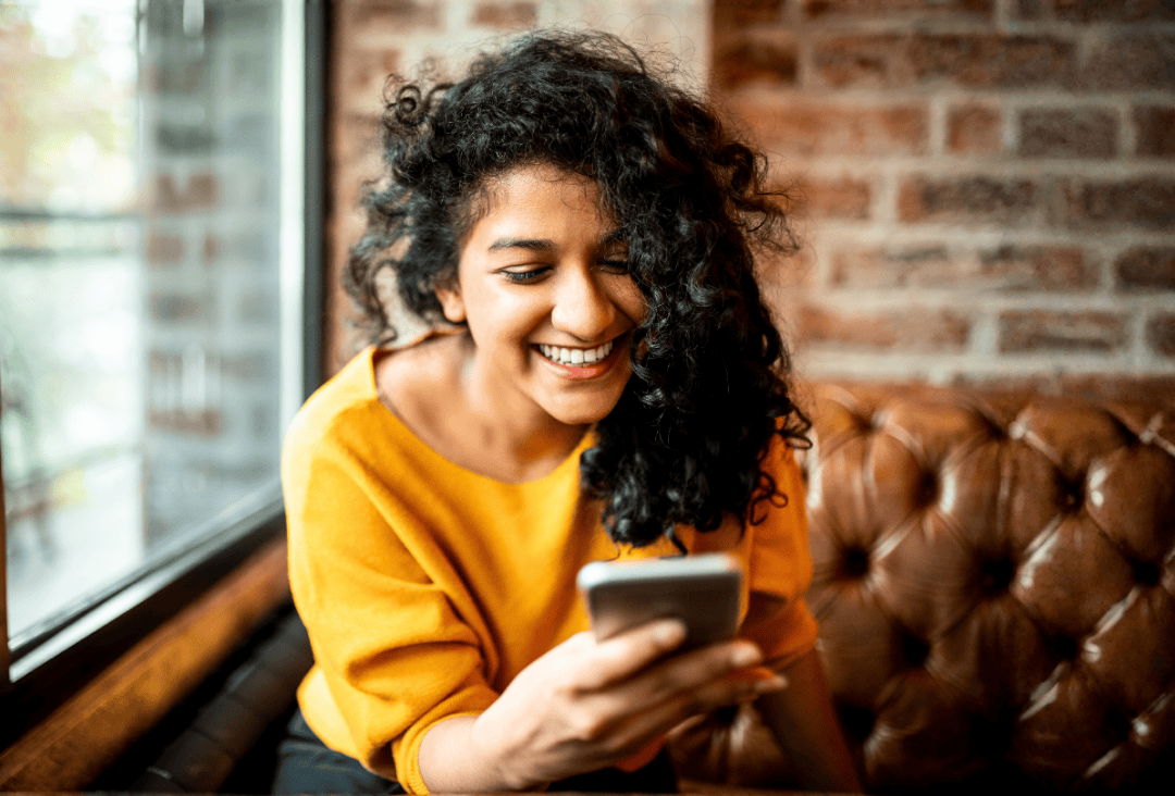 Woman watching her savings interest grow with the latest money market rates.
