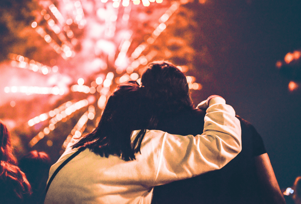 People watching a Fourth of July fireworks display they purchased with help from a personal loan.