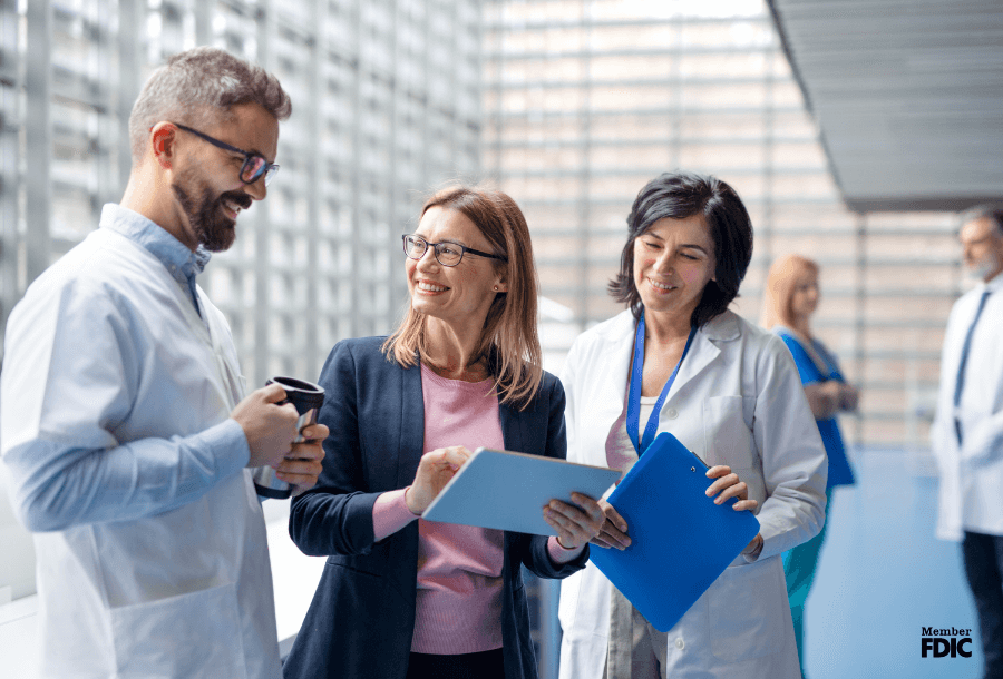 Doctors look over the application for a line of credit for pharmaceuticals and healthcare