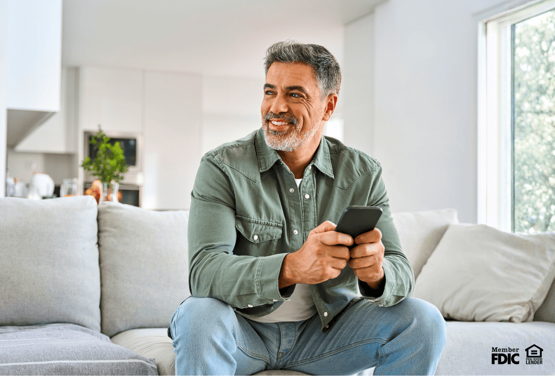 Man in his 60s benefitting from choosing the best installment loans, like mortgages and personal loans.