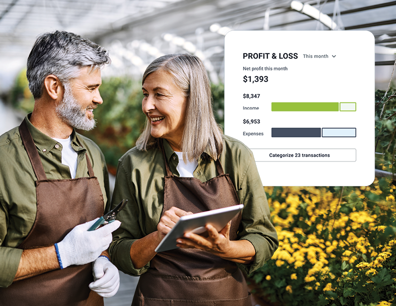 Business owners reviewing profits and expenses through their Academy Bank Business Banking account with Payments Suite