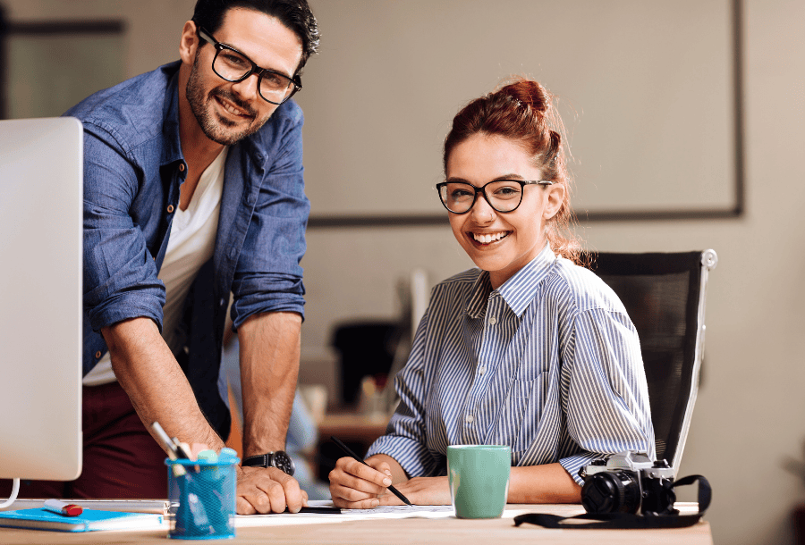 Two small business owners benefitting from SBA loans.