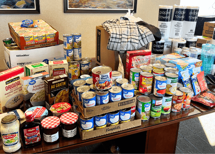 Academy bank collects canned and non-perishable food items for Days of Giving Charity event