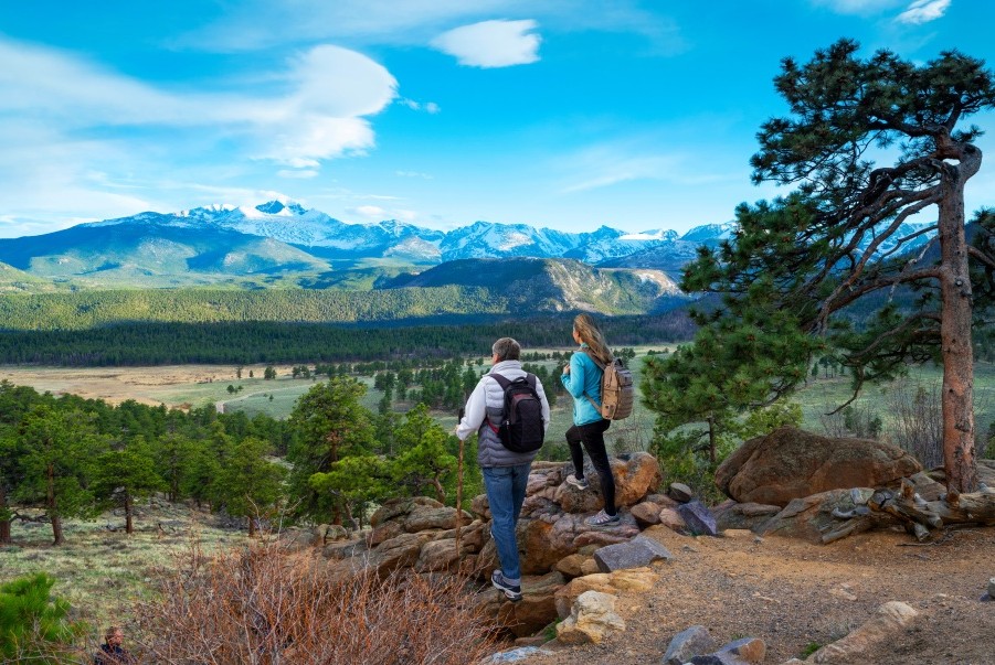 Couple hiking in Colorado Springs searching for the best CD rates