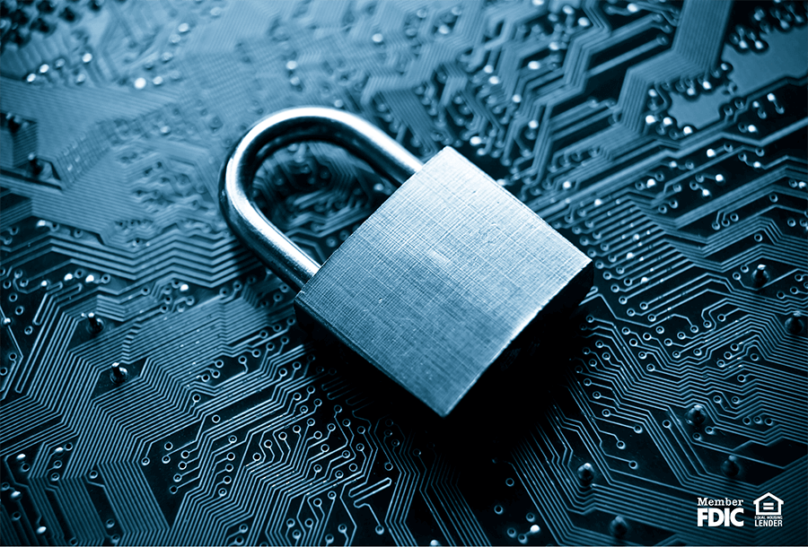 a padlock sitting on a circuit board symbolizing strength and security through FDIC insurance.