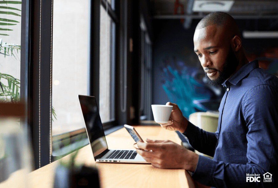 a man checks his emails to make sure there are no scams