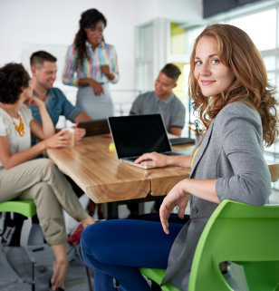 Business woman participates in company meeting