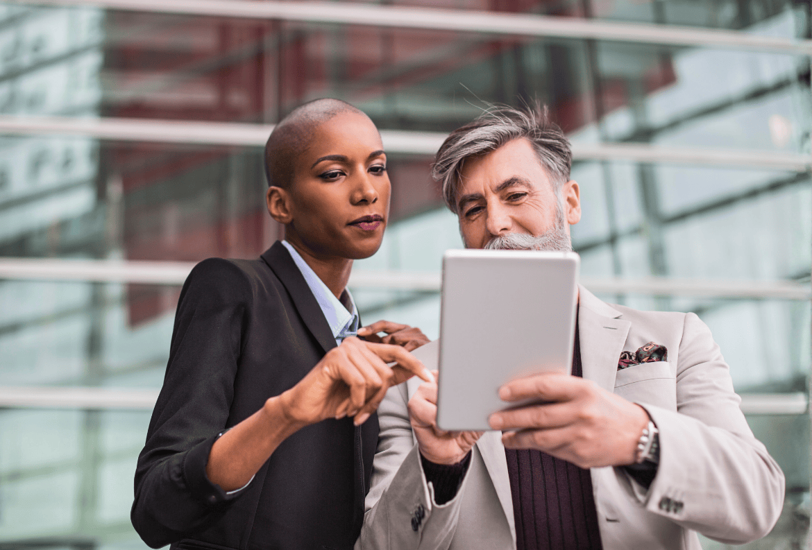 Colleagues discussing treasury management products like fraud prevention, liquidity management, payables and receivables, and more.