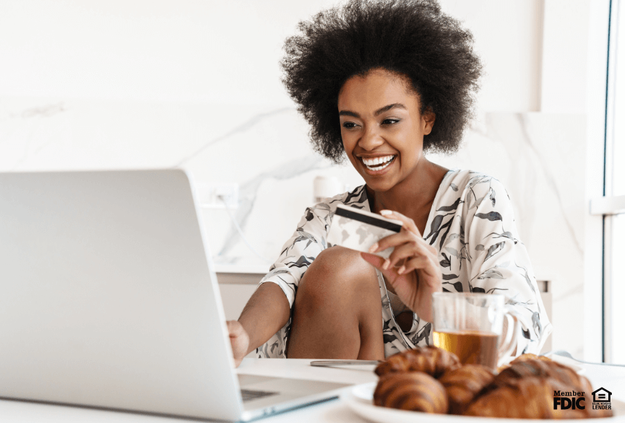 a woman checks her credit through online banking