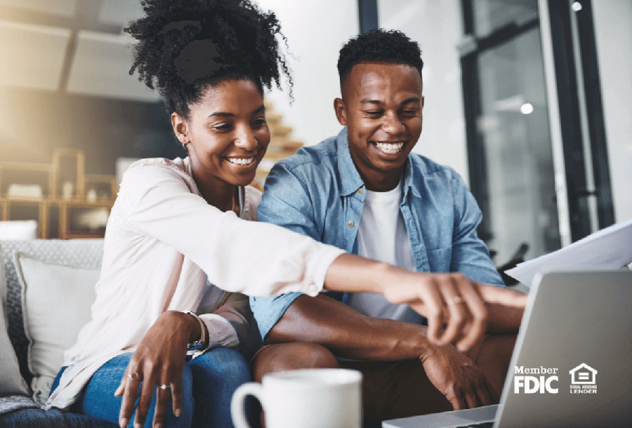 a man and woman go over saving account options