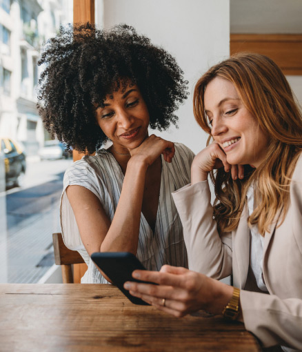 two people looking at phone