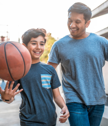 family playing basketball