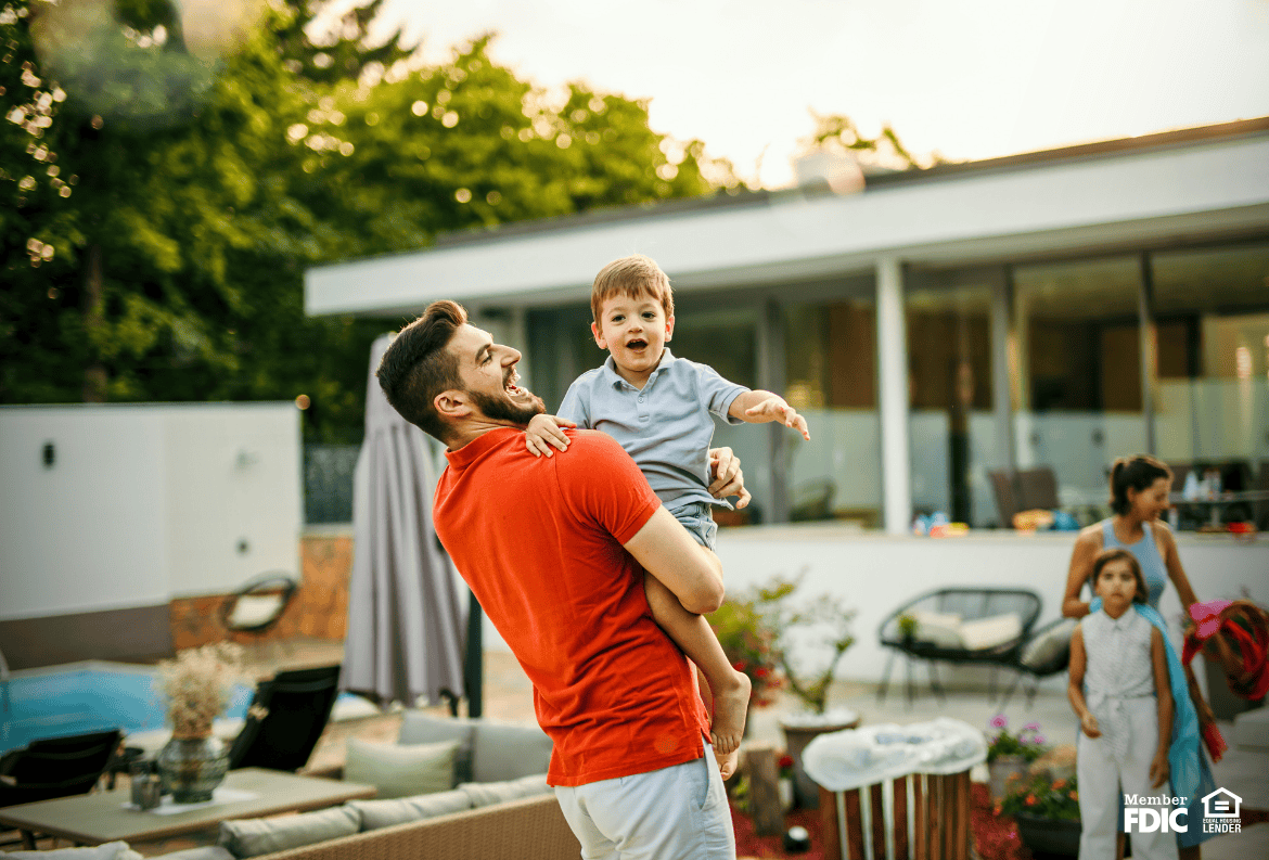 Family enjoying themselves in their luxury home they purchased with a jumbo loan