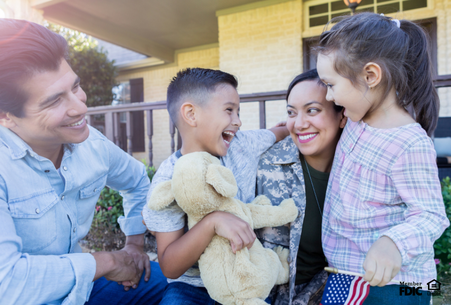 a military family celebrates the new home they bought with a VA loan