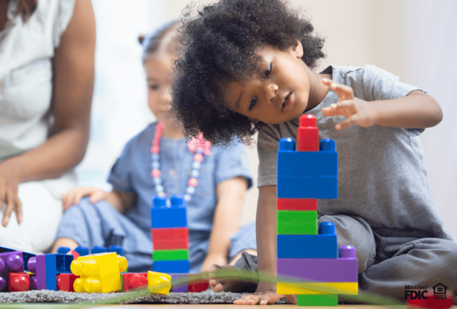 little kids play with toys at daycare