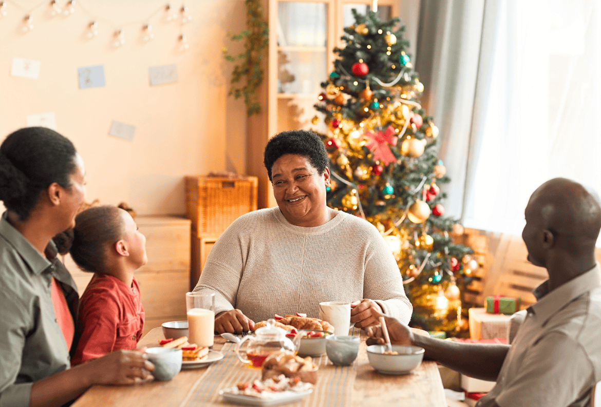 Family sitting together over the holidays, feeling thankful they could pay for everything with a personal loan.