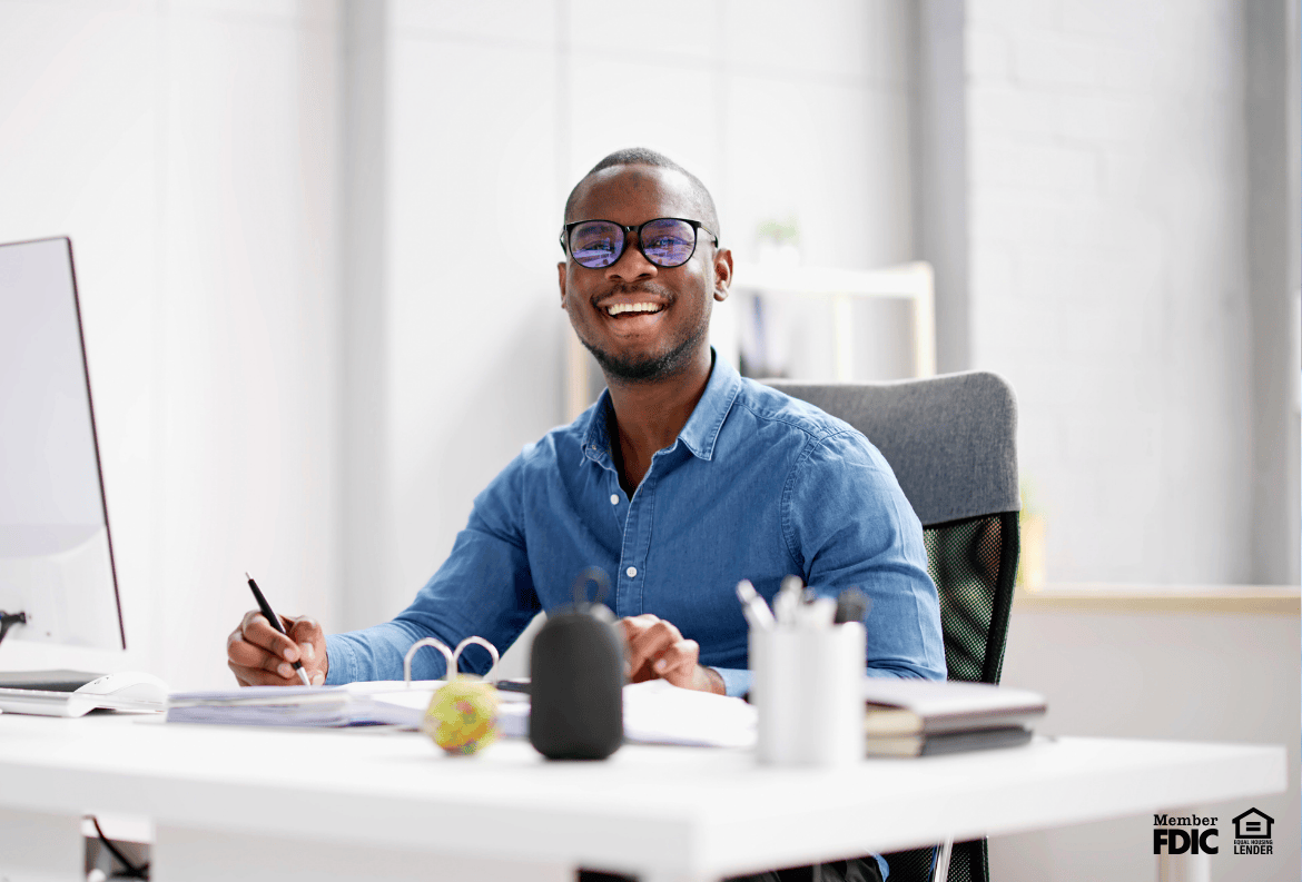 Satisfied fintech professional after a successful fintech banking partnership for secured credit access.