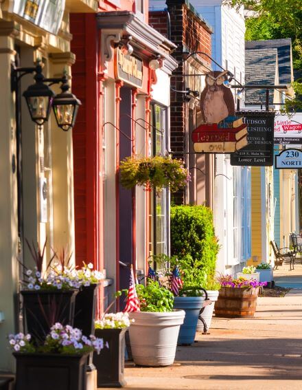 a beautiful small town street filled with family businesses