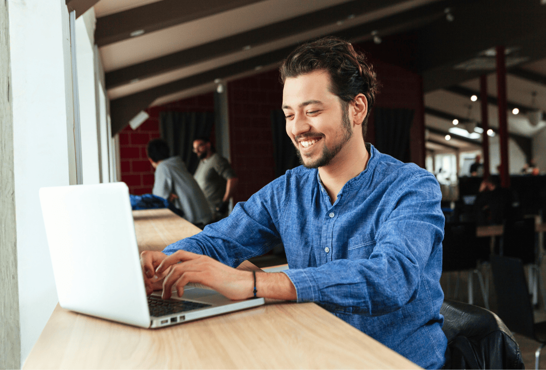 Man finishing his tax return and using direct deposit for IRS refund.