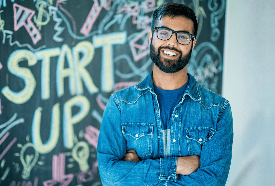 Small business startup owner growing his company with a startup business checking account.