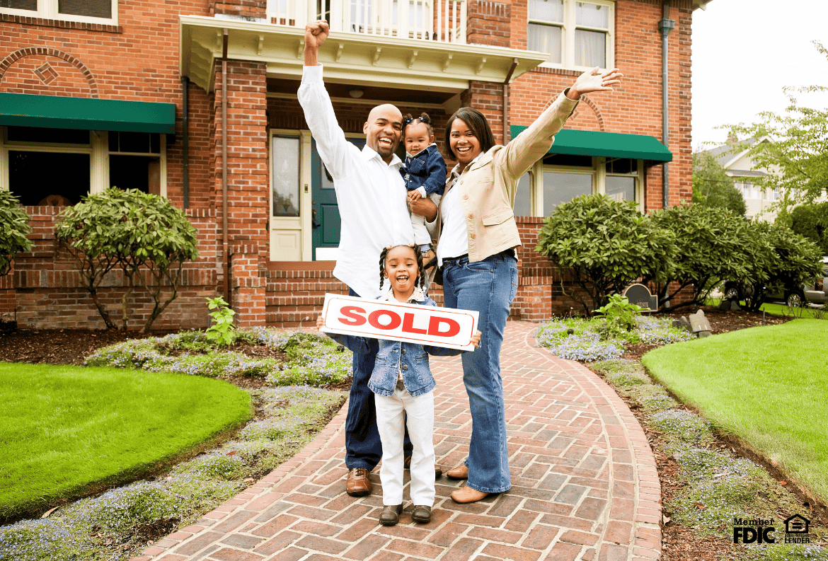 Family celebrating new home purchase with the best mortgage rates today.