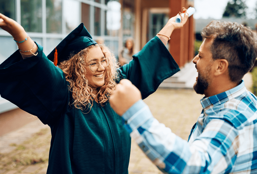 Father celebrating daughter's high school graduation before he saves money on her grad party.