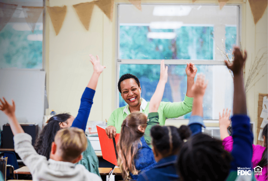 After qualifying for a Hero Home Loan for teachers, an educator teaches her class.