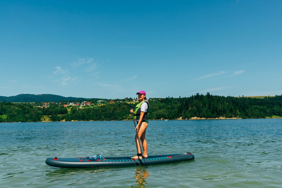 Woman paddleboarding in Denver